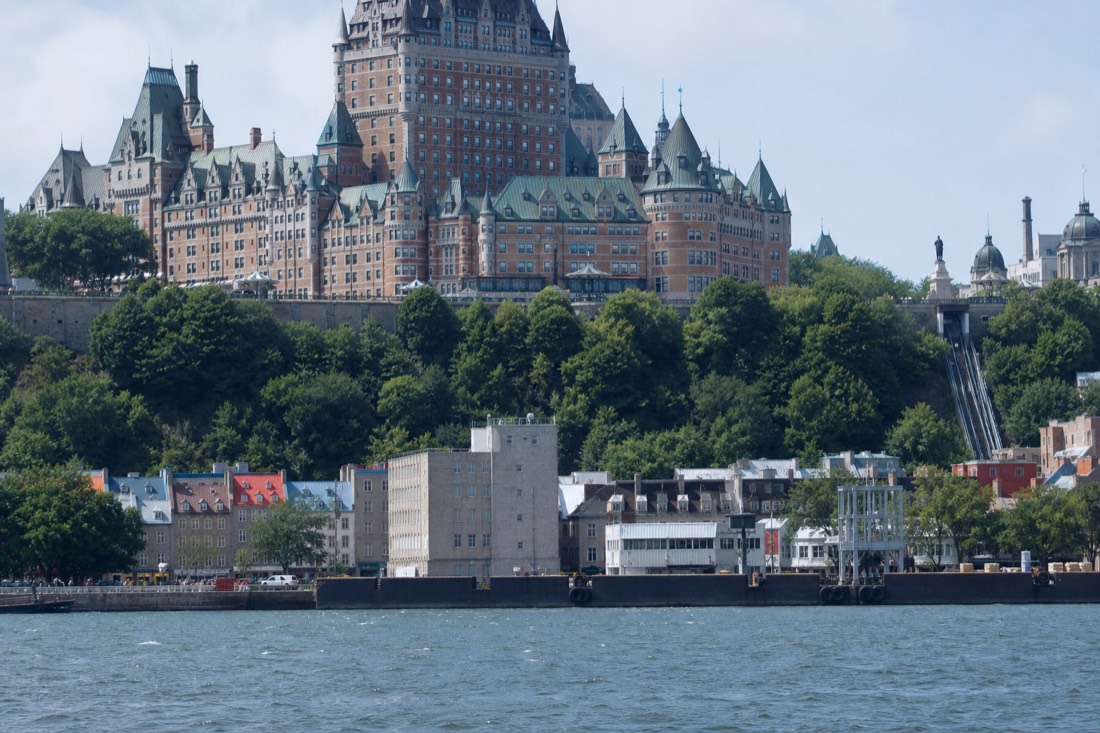 The layered view of Quebec City from the St. Lawrence River with Lower Town, the cliff and the Château Frontenac above