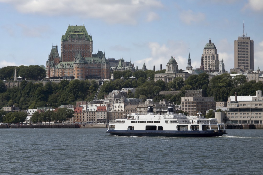 The Québec City to Lévis ferry crossing the St. Lawrence with the Old Quebec skyline behind