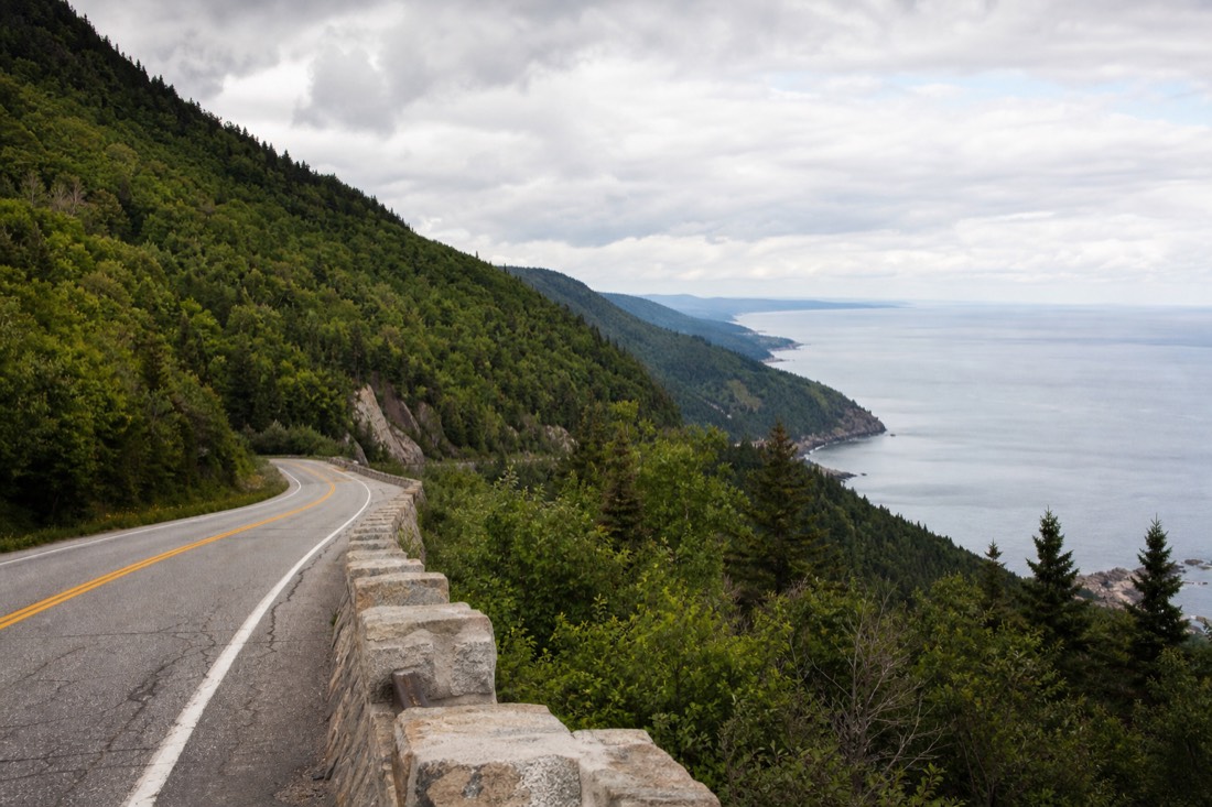 Route 138 climbing along the Charlevoix hills with the St. Lawrence River below northeast of Quebec City