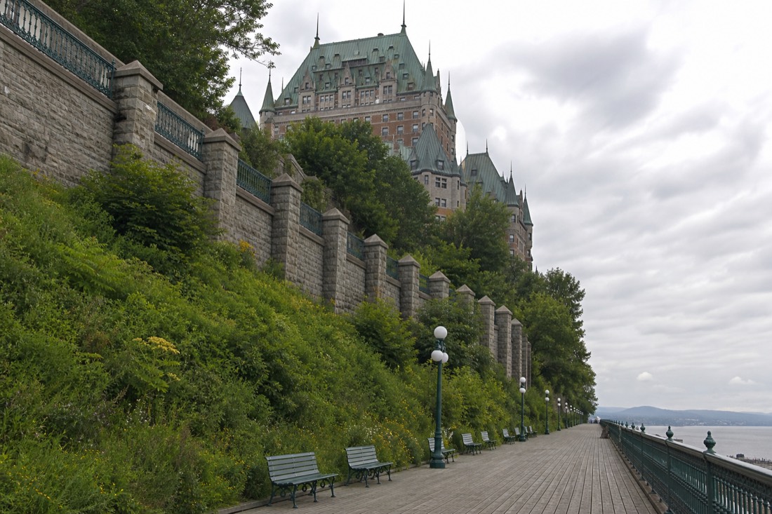 The Dufferin Terrace boardwalk running along the cliff edge beneath the Château Frontenac in Old Quebec