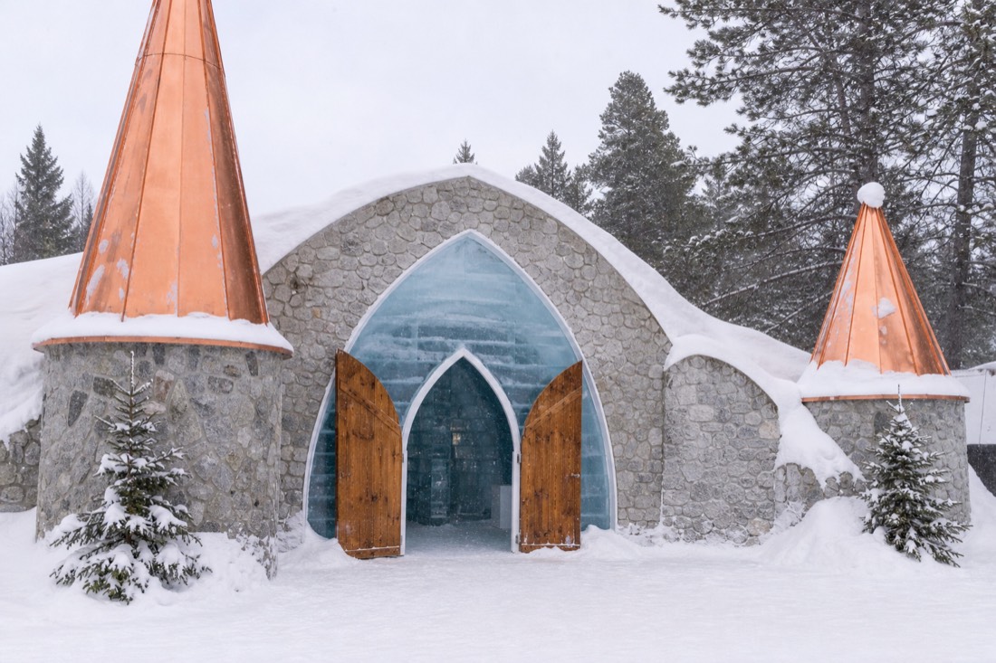 Exterior of the Hôtel de Glace ice hotel at Village Vacances Valcartier near Quebec City under snow
