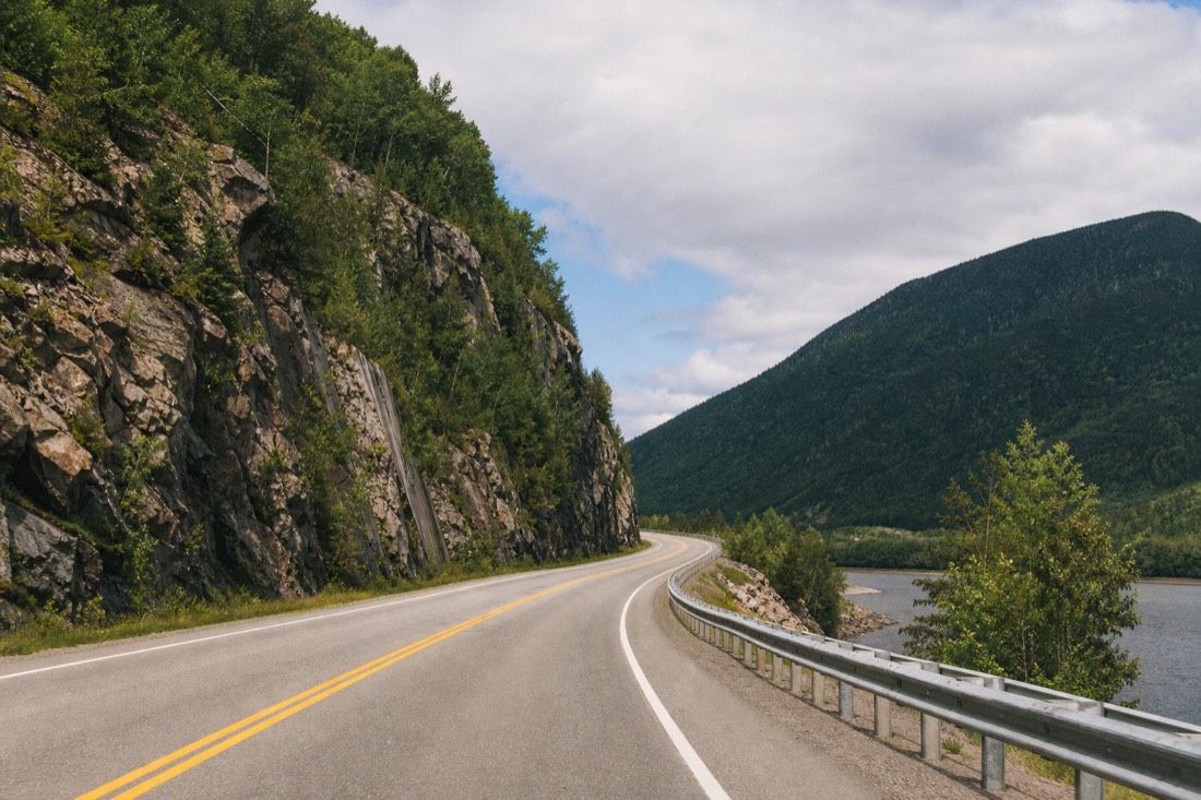Highway 175 heading north from Quebec City into the forested hills toward Jacques-Cartier National Park
