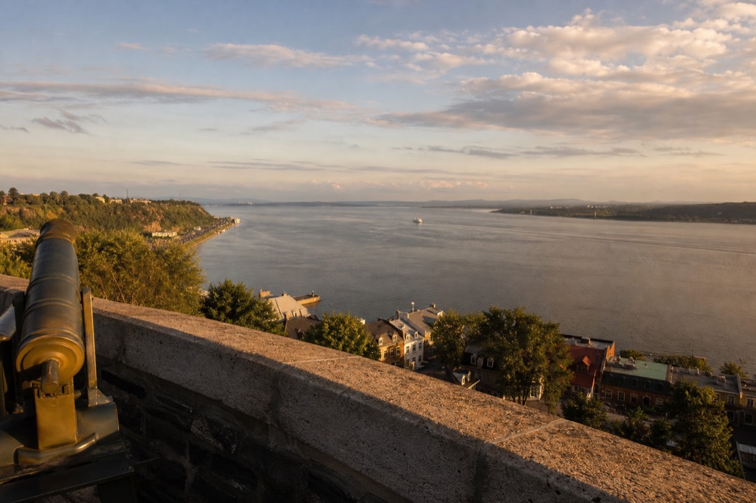 Wide view of the St Lawrence River from Dufferin Terrace in Quebec City at golden hour