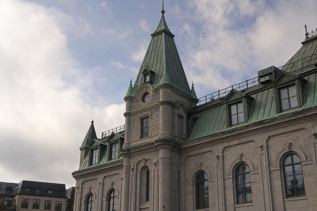 The chateau style facade and copper roof of Gare du Palais station in Quebec City