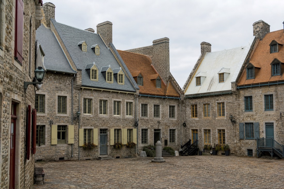 Cobblestone Place Royale square in Quebec City ringed by 17th-century stone houses with steep roofs