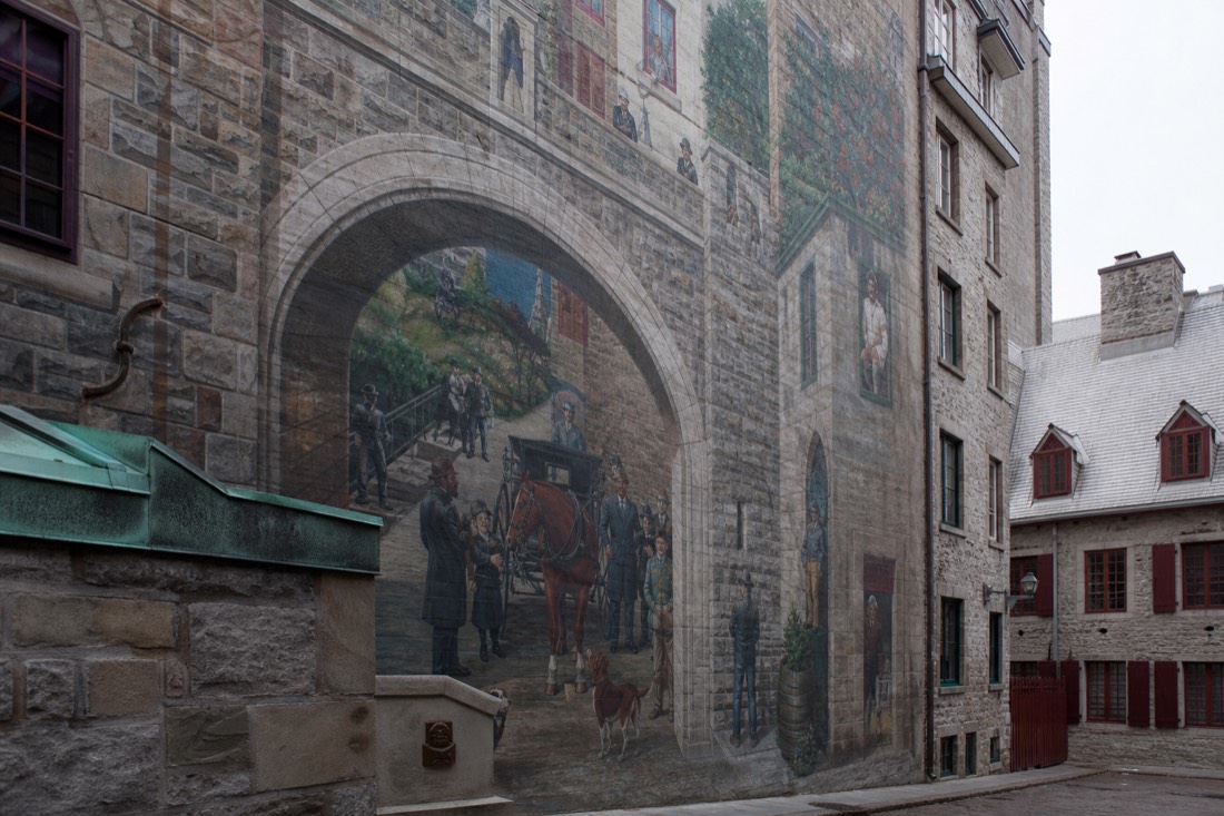 Fresque des Quebecois trompe-l'oeil mural near Place Royale showing a painted stone streetscape with historical figures