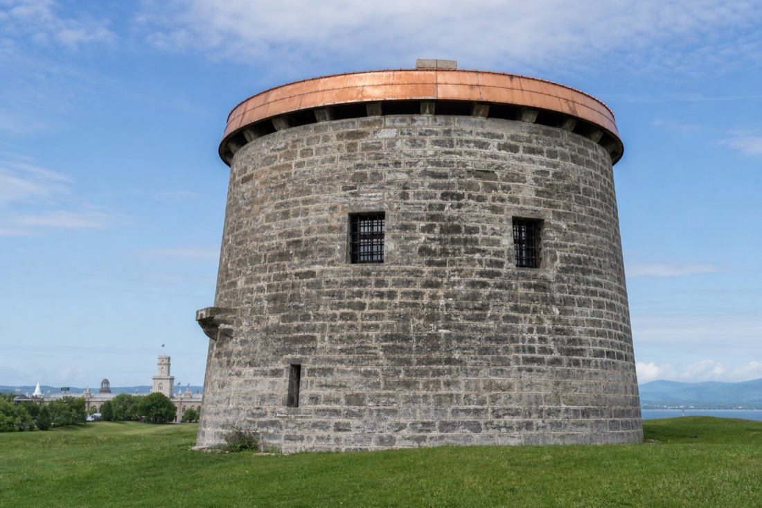 Round stone Martello tower standing on the grass of the Plains of Abraham in Quebec City