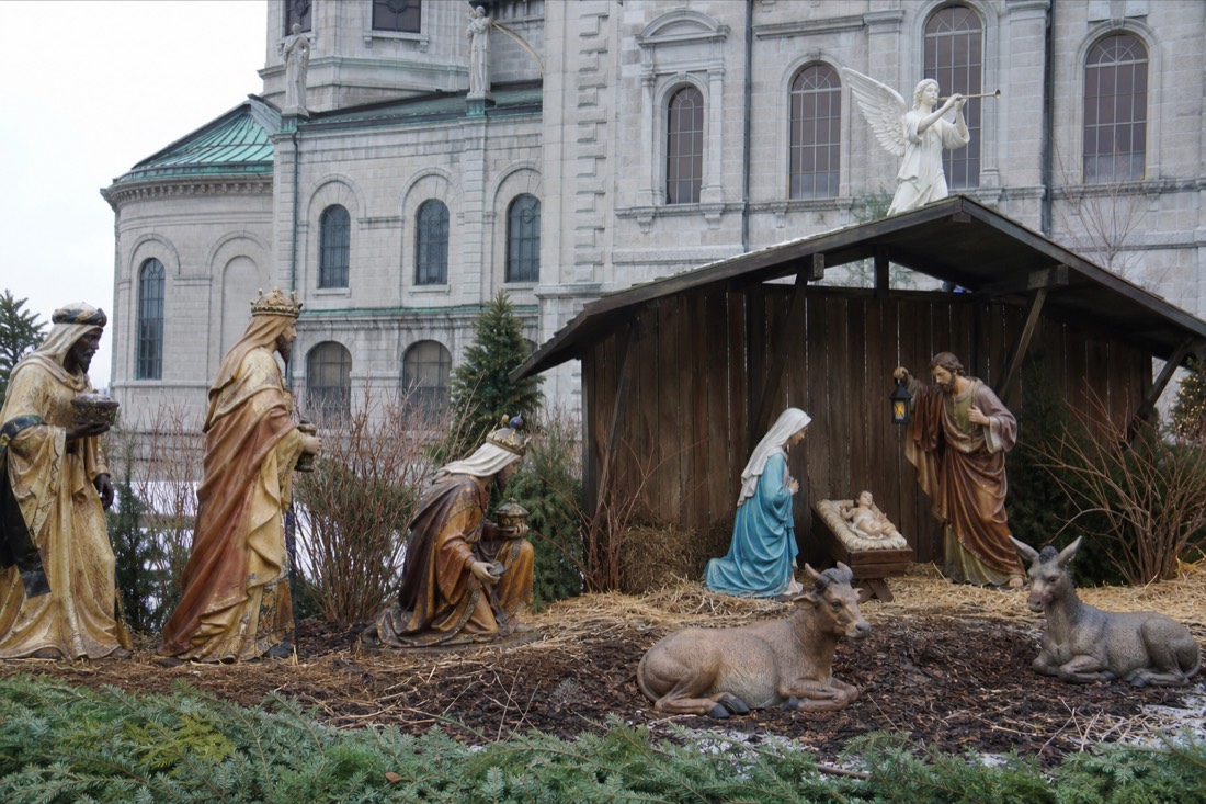 Life-size nativity scene in the garden of the Notre-Dame de Quebec basilica-cathedral at Christmas