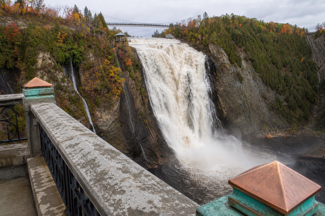 Montmorency Falls plunging past the suspension bridge viewpoint near Quebec City
