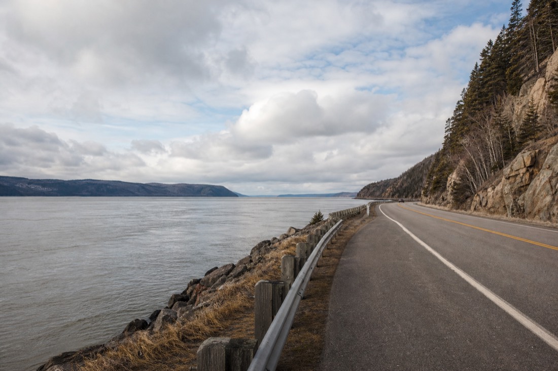 Cote-de-Beaupre shore road between Montmorency Falls and Sainte-Anne-de-Beaupre with the St Lawrence River alongside