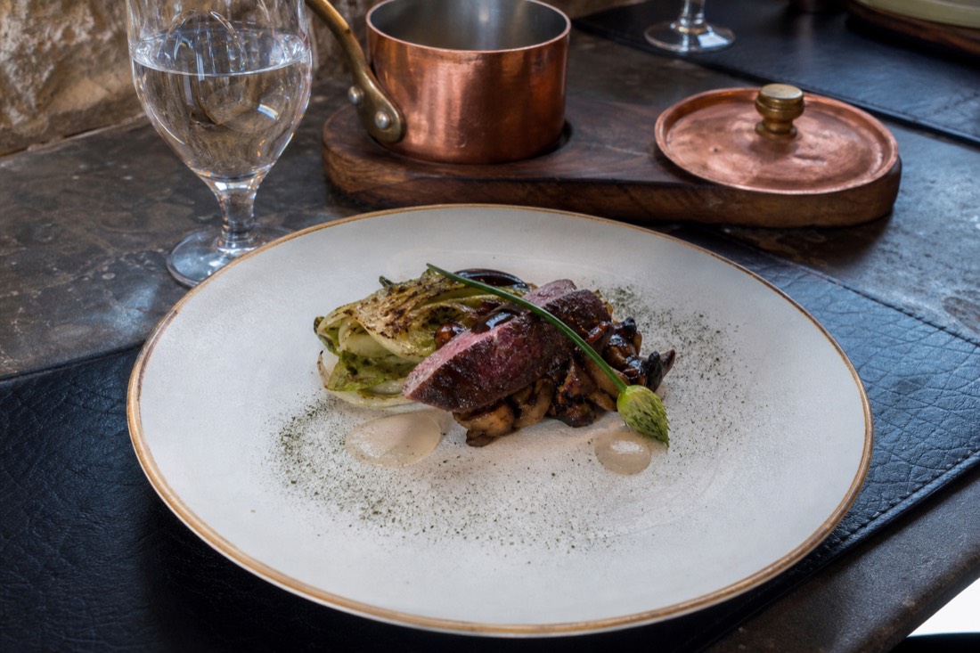 A plated tasting-menu course at a fine dining restaurant in Old Quebec