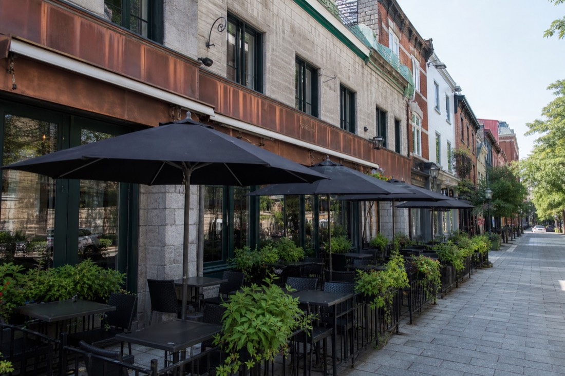 Diners at outdoor tables along rue Saint-Joseph in the Saint-Roch district of Quebec City