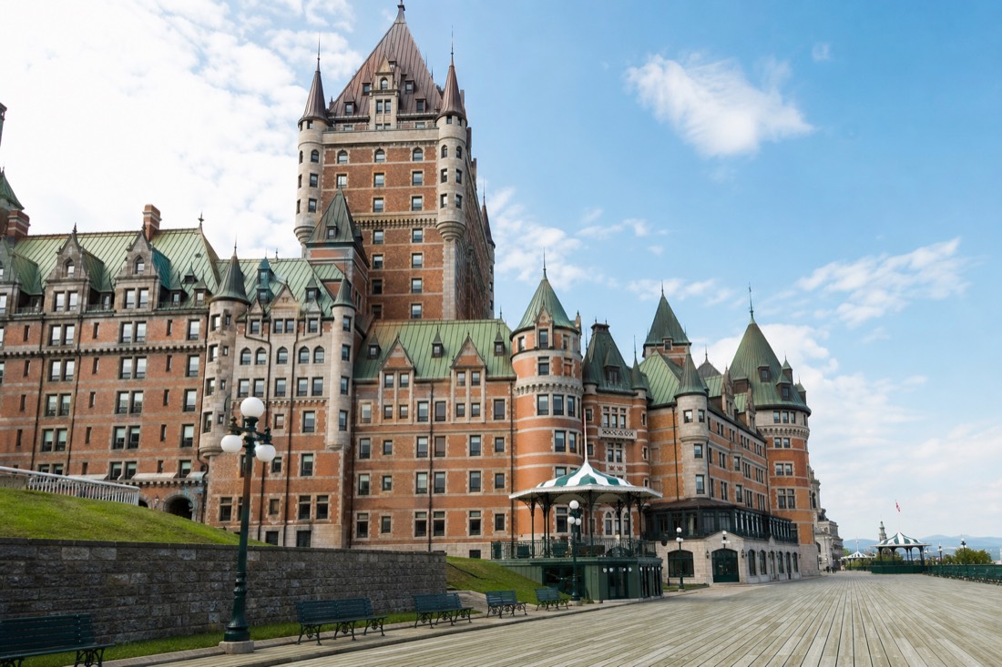 The copper turrets of the Château Frontenac seen from the boardwalk of Dufferin Terrace